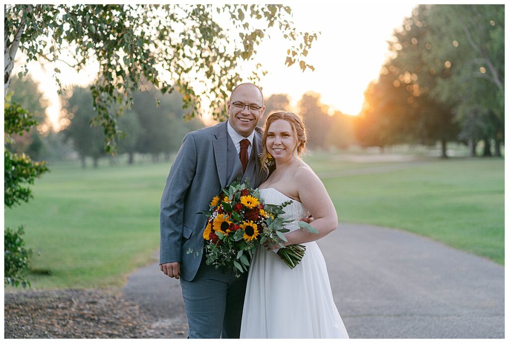 A wedding photo of a sunset at Cloverbank Country Club